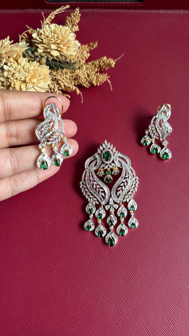 Nazia screw-back earrings in white-tone setting on a gold-tone base