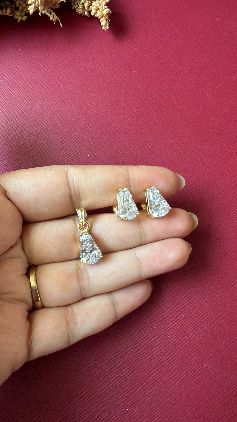 Gold-tone American Diamond pendant set from Hema Collections