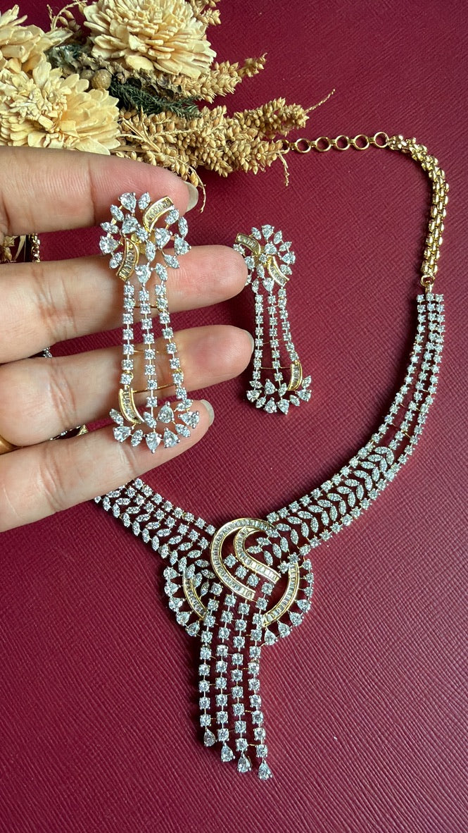 Farida AD necklace set with swirl centrepiece, cascading CZ fringe and matching long drop earrings