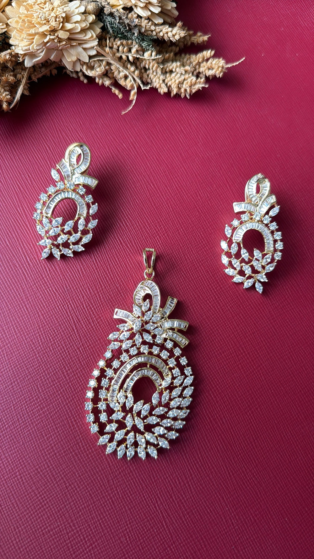 Gold-tone American Diamond pendant set from Hema Collections