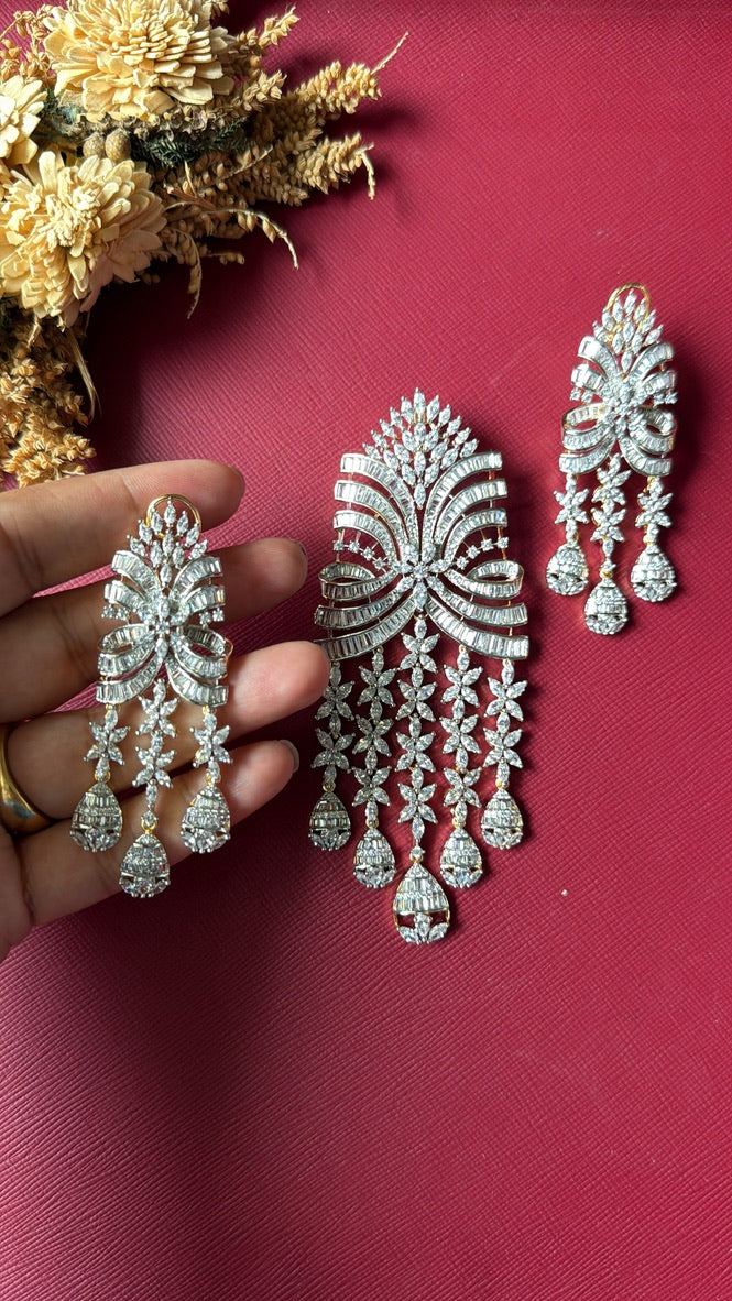 Bucket-style setting with round brilliant cut white CZ stones