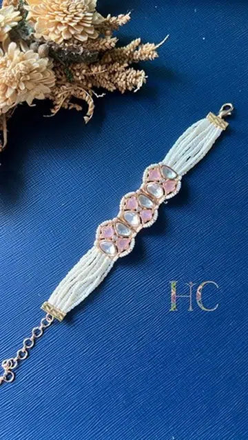 Ira Kundan pearl-style bracelet worn on wrist, festive wear for women