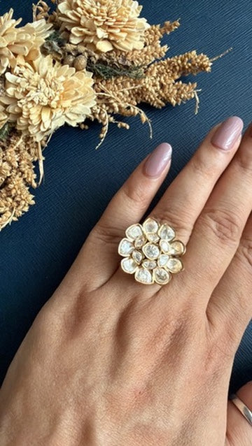 Rupam Kundan Ring with white Kundan stones in a floral design and golden polish, worn on the hand – adjustable cocktail ring by Hema Collections