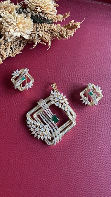 Gold-tone green American Diamond pendant set from Hema Collections