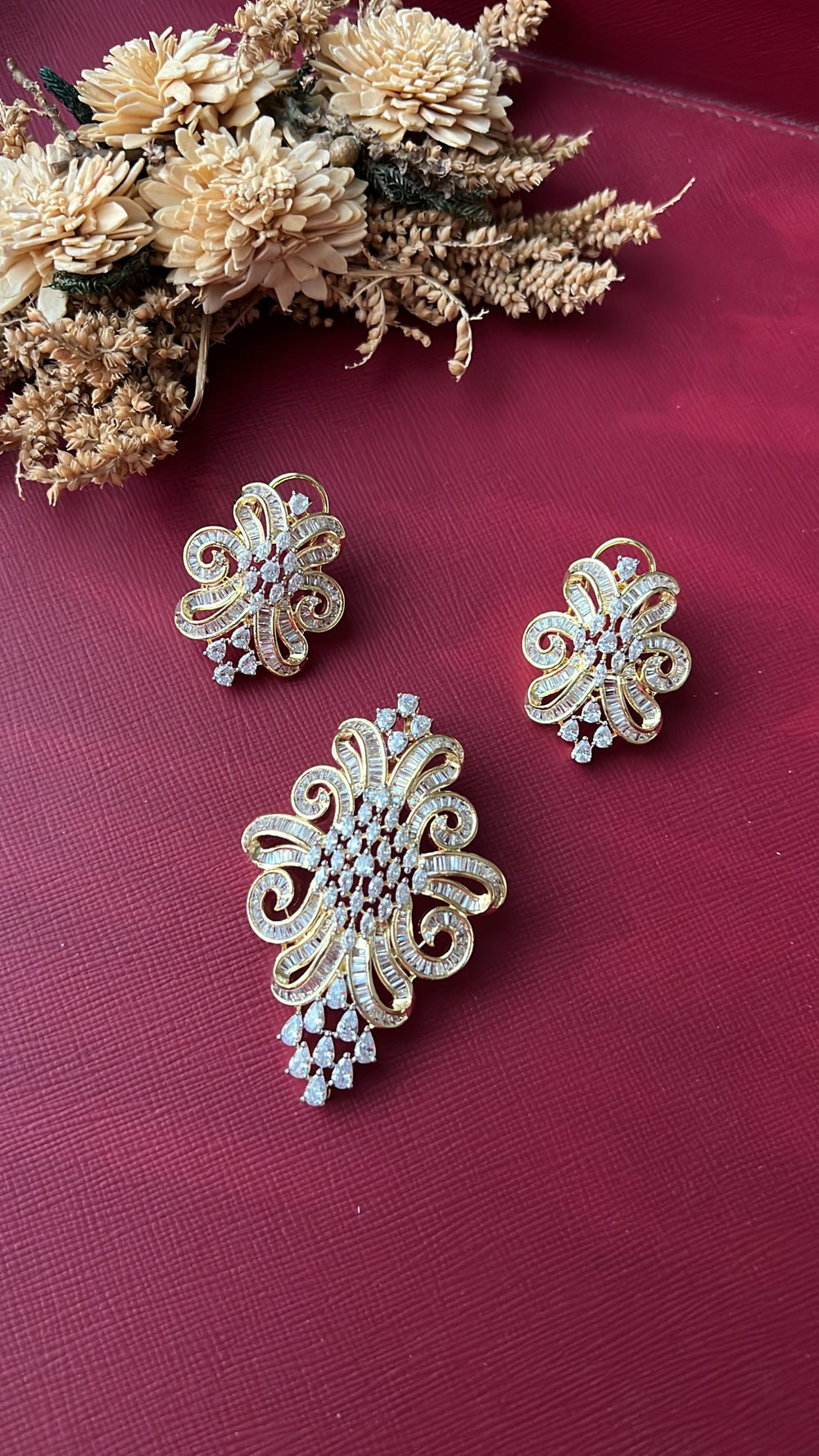Gold-tone American Diamond pendant set from Hema Collections
