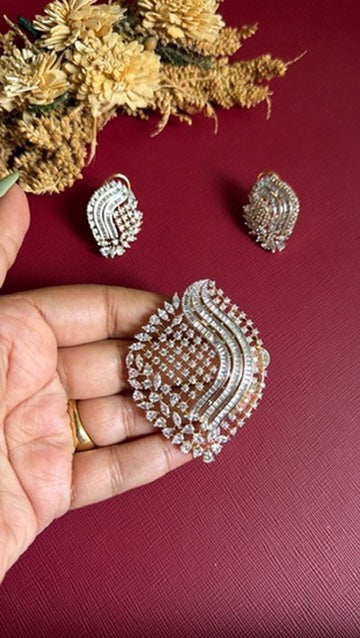 Sana American Diamond statement pendant held in hand to show size