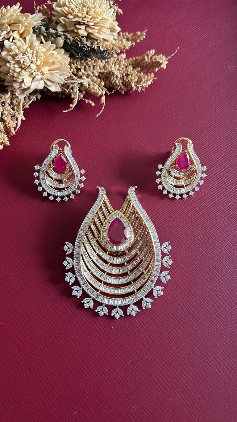 Gold-tone ruby red American Diamond pendant set from Hema Collections