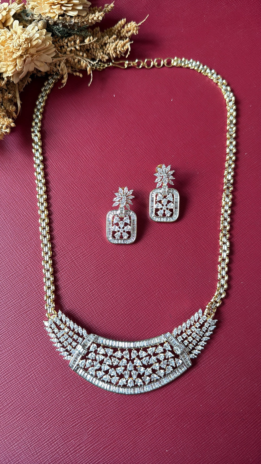 Gold-tone American Diamond pendant set from Hema Collections