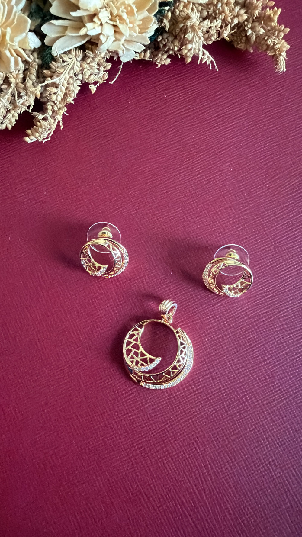 Gold-tone American Diamond pendant set from Hema Collections