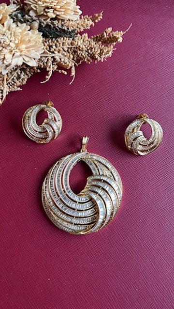 Gold-tone American Diamond pendant set from Hema Collections