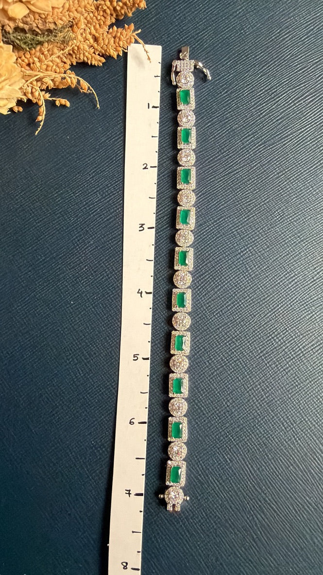 Rubina Diamond Tennis Bracelet beside a ruler, measuring about 7 inches with box clasp