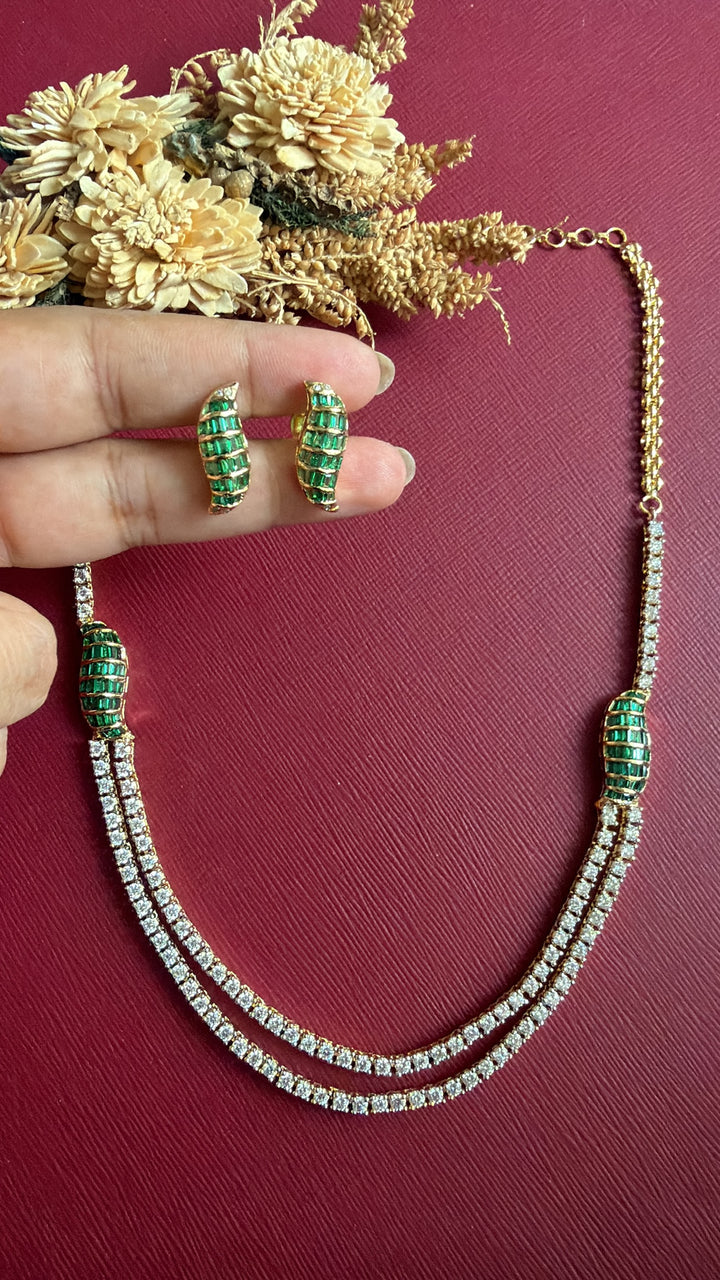 Eliana layered American Diamond necklace with emerald-green baguette motifs