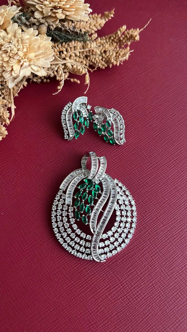 Gold-tone green American Diamond pendant set from Hema Collections
