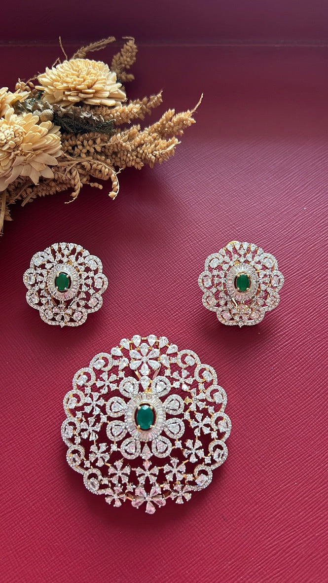 Gold-tone green American Diamond pendant set from Hema Collections