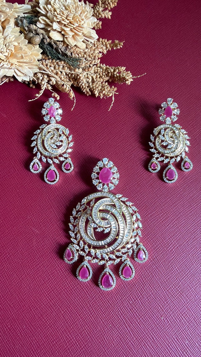 Close view of the Ramya pendant, baguette-cut white stones in a swirl with marquise edging