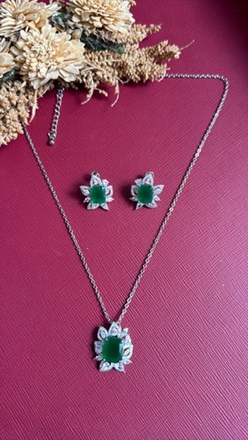 Gold-tone green American Diamond pendant set from Hema Collections