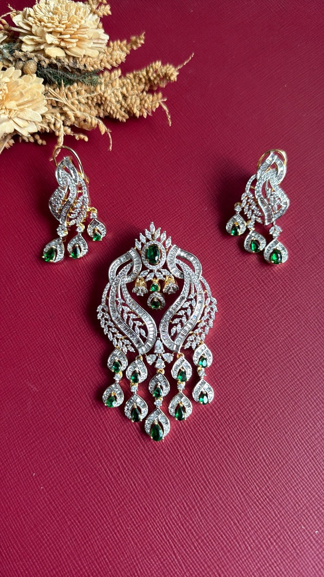 Close-up of the green cushion-cut centre stone and AAA CZ surround on the Nazia pendant