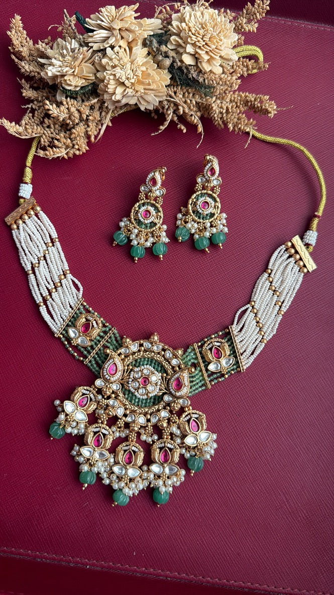 Arvika ethnic necklace with green and white kundan-style stones, gold polish finish
