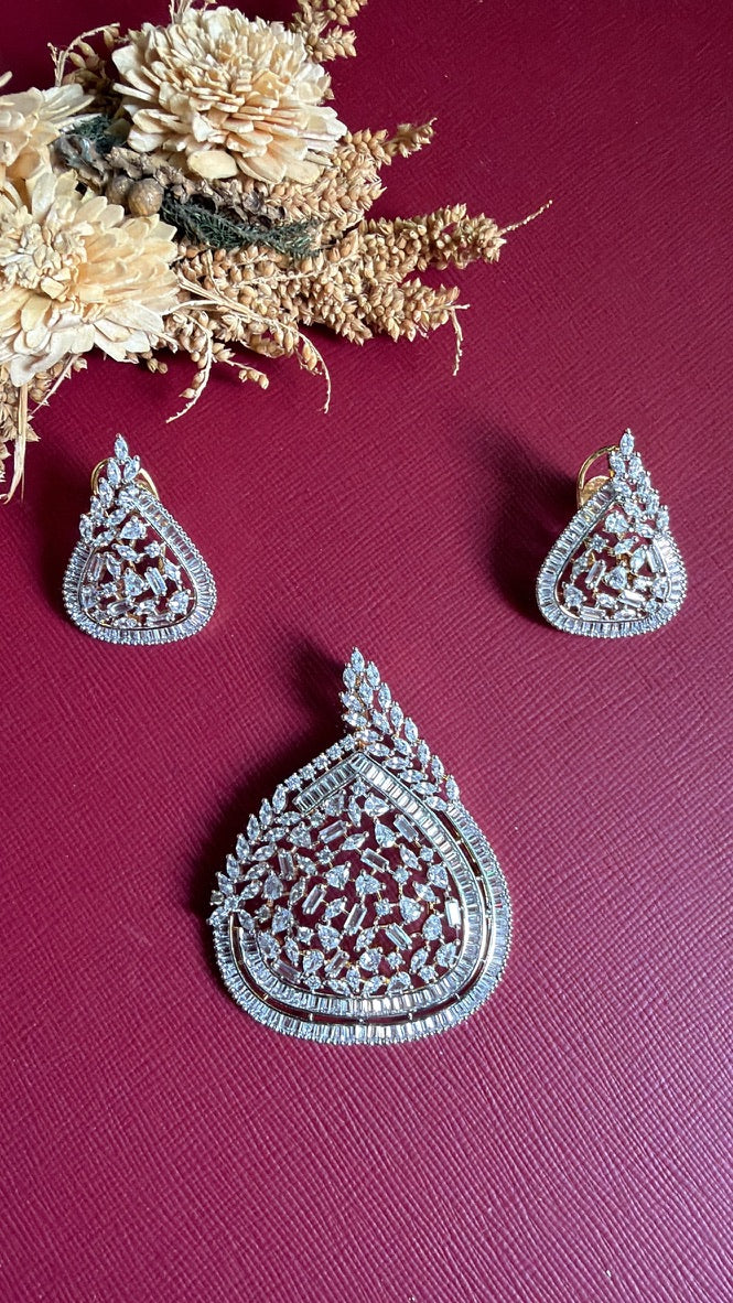 Anagha dual-tone American Diamond pendant with baguette border and marquise leaf spray