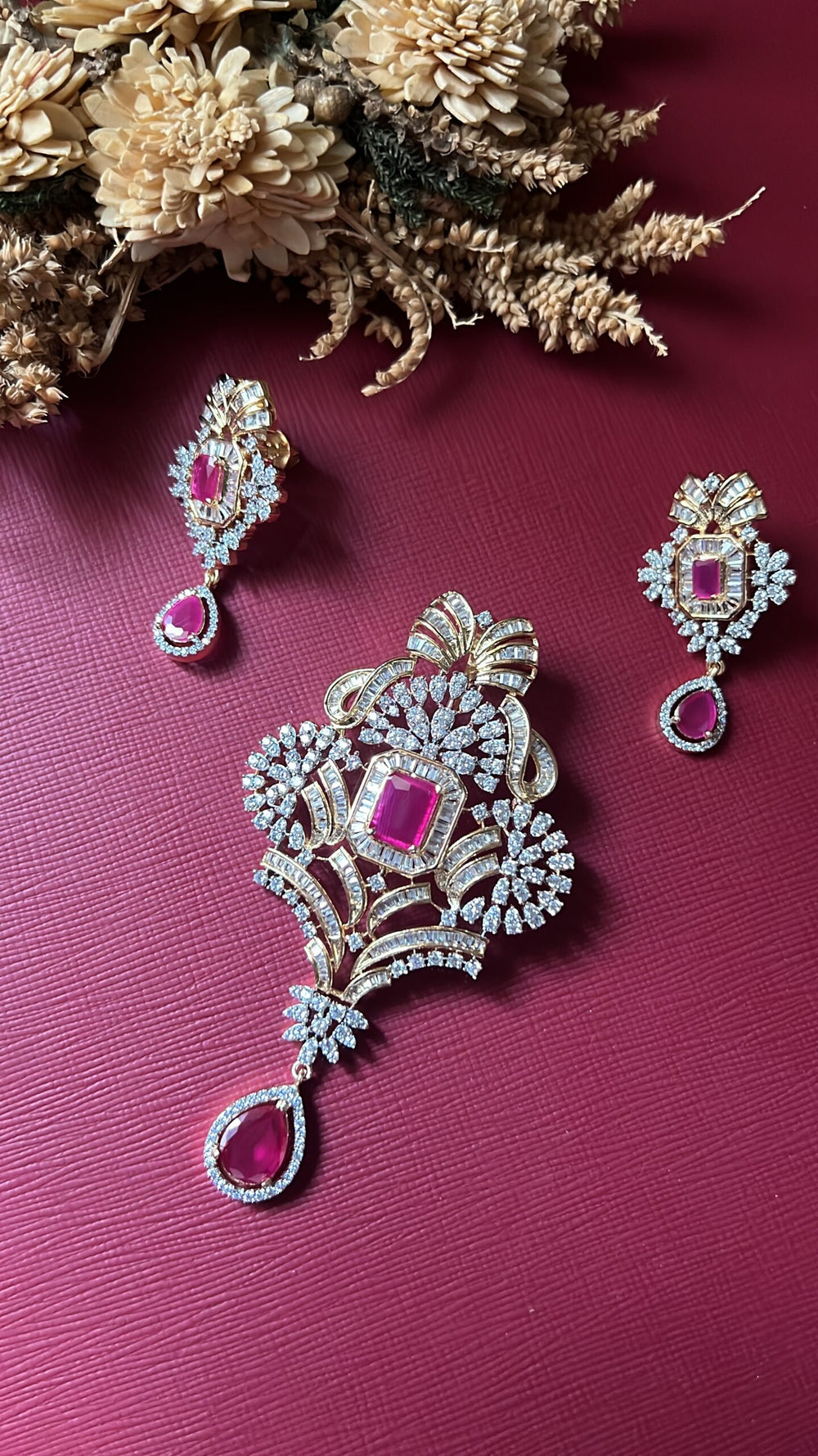 Gold-tone ruby red American Diamond pendant set from Hema Collections