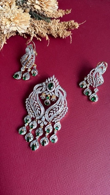 Nazia pendant set shown in full, 2.75 inch pendant with matching earrings