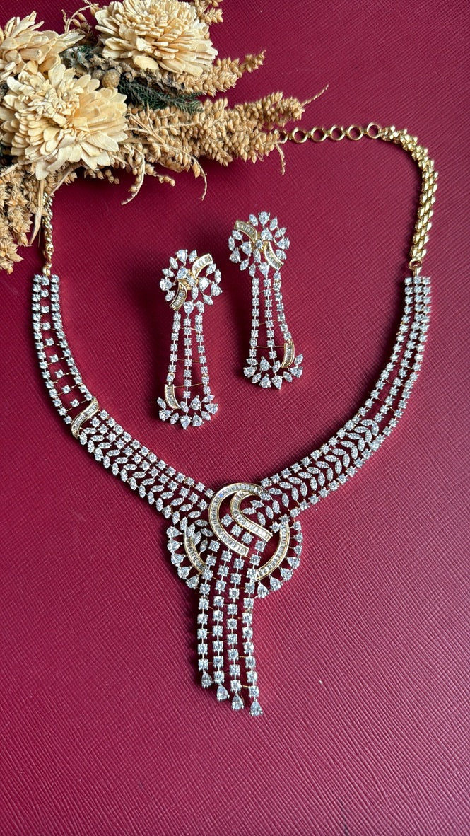 Farida CZ diamond-look necklace set with leaf-pattern stones and gold-toned back chain, top view