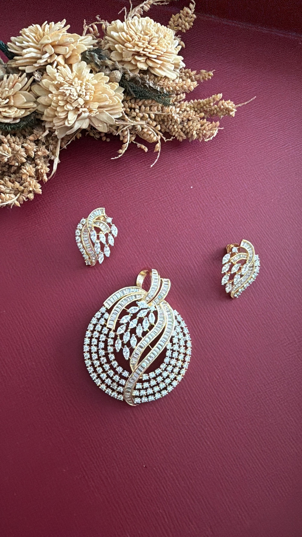 Gold-tone American Diamond pendant set from Hema Collections
