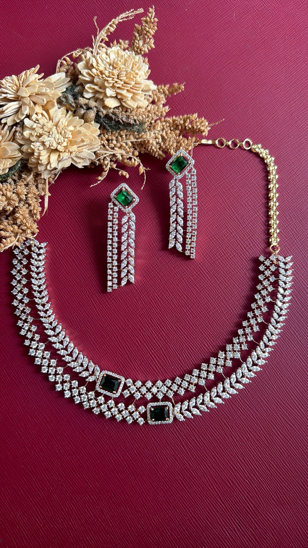 Vedika two-layer American Diamond necklace with criss-cross and marquise leaf rows, gold-toned back chain