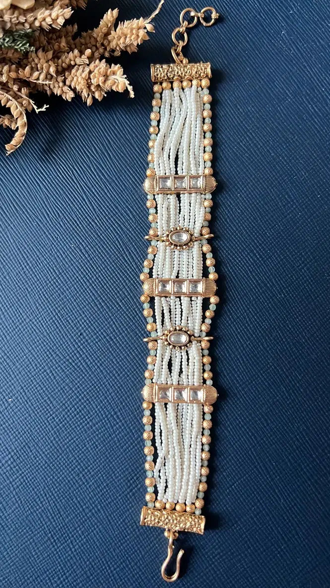 Pearl-style Kundan bracelet worn on wrist, versatile festive jewellery