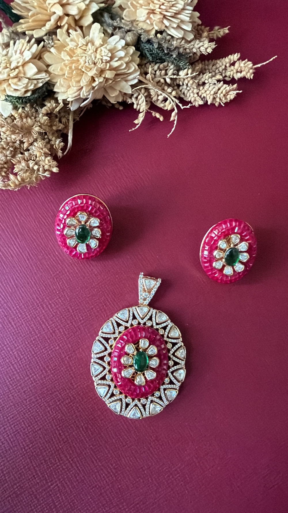 Matching push-back earrings from the Ruby Pallavi Kundan pendant set