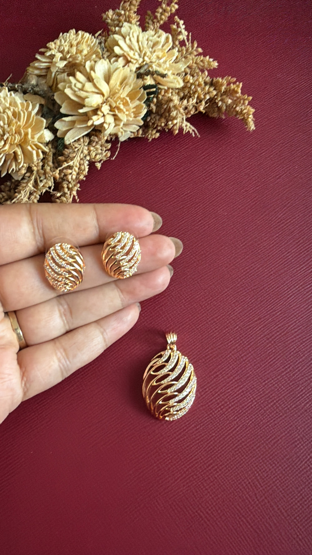 Gold-tone American Diamond pendant set from Hema Collections