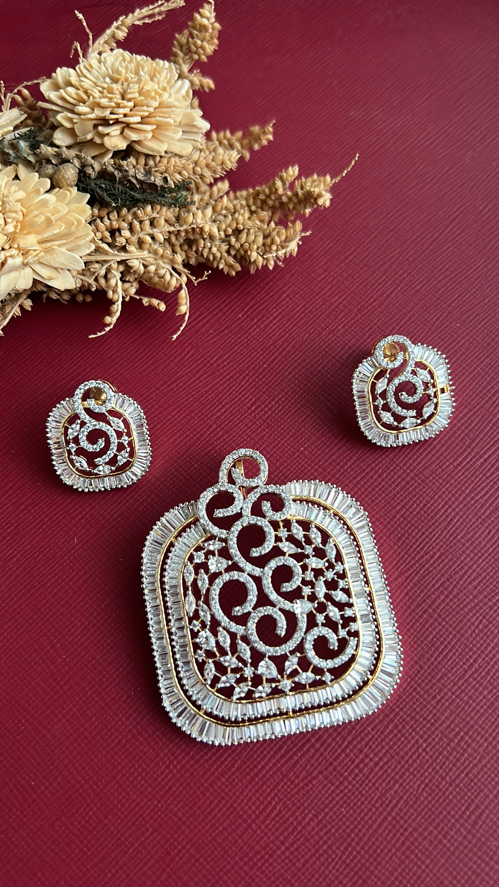 Gold-tone green American Diamond pendant set from Hema Collections