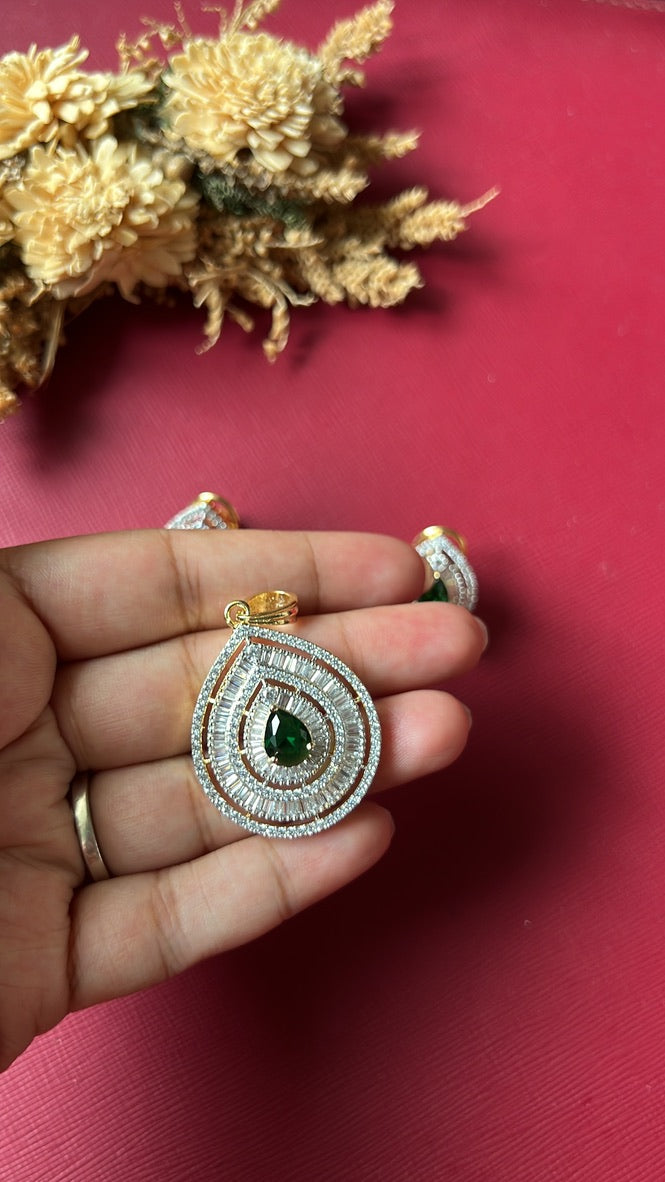 Gold-tone green American Diamond pendant set from Hema Collections