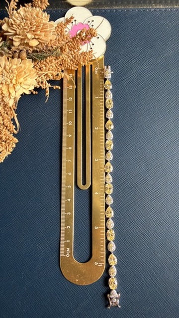 Namra butter yellow tennis bracelet worn on the wrist