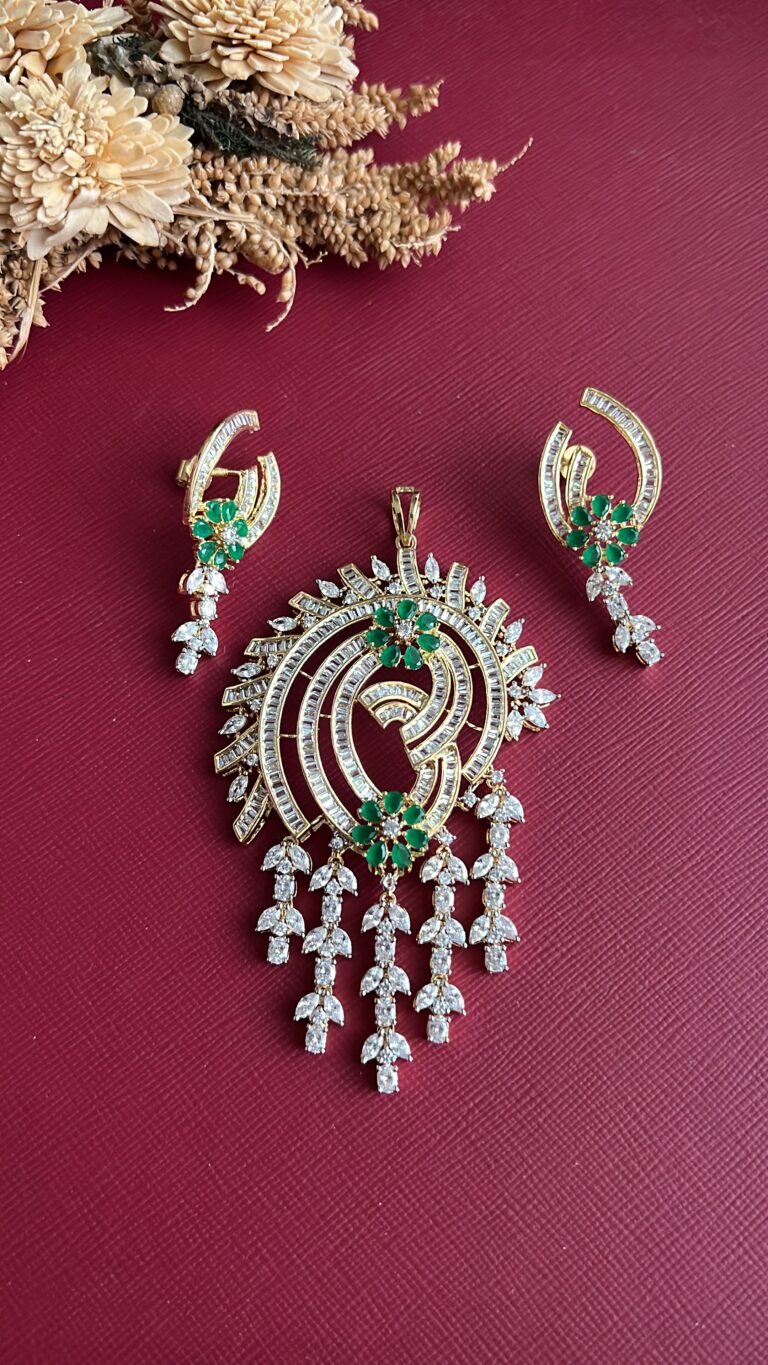 Gold-tone green American Diamond pendant set from Hema Collections