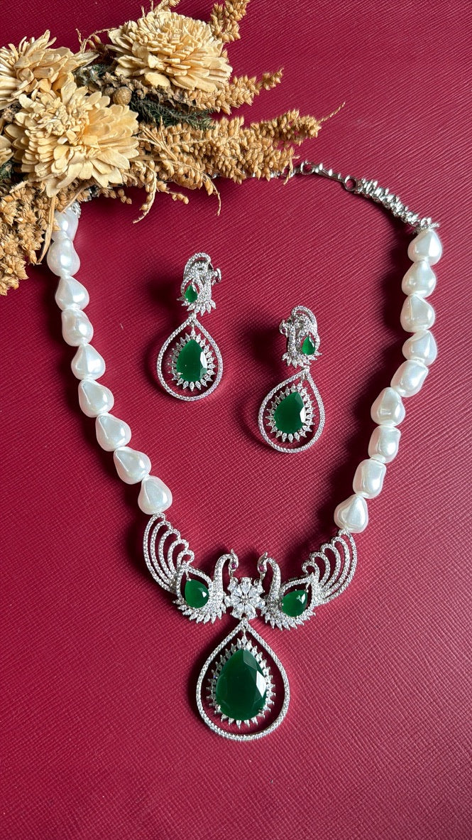 Close-up of the green centre stone and AAA CZ setting on the Babira silver-tone necklace