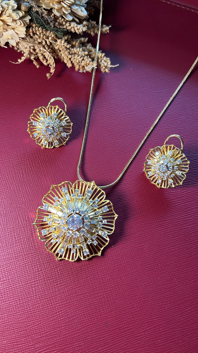 Gold-tone American Diamond pendant set from Hema Collections