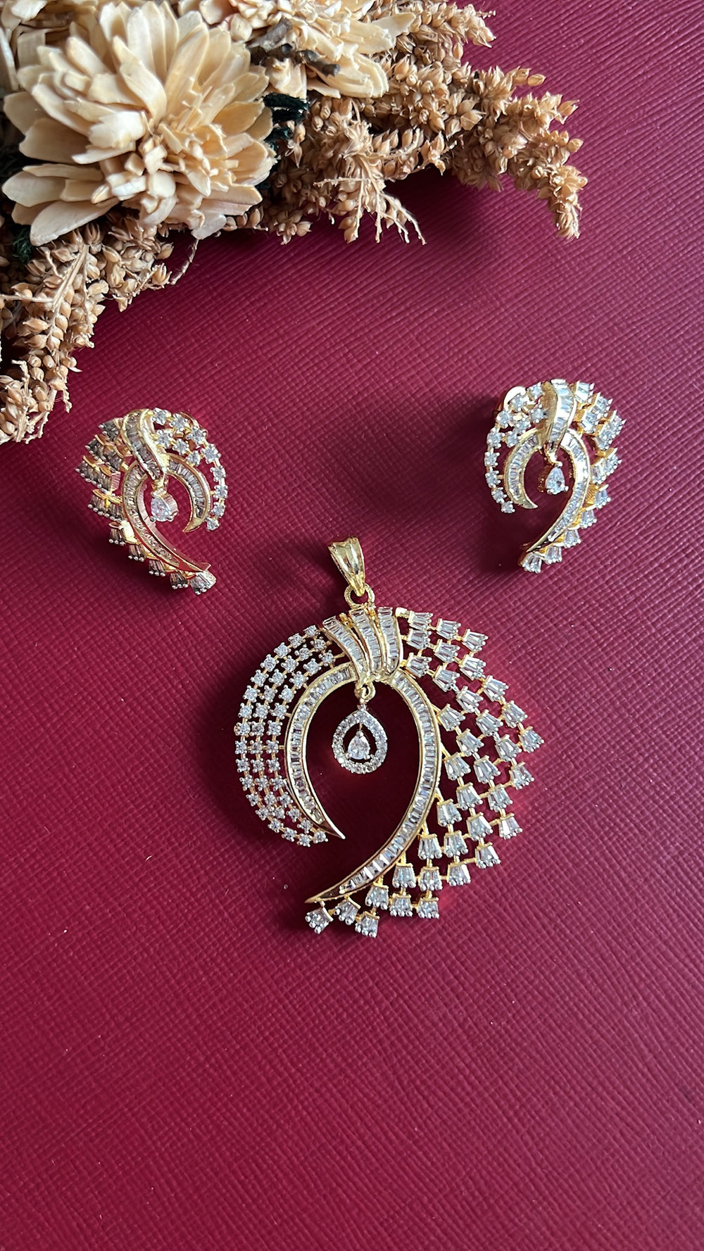 Gold-tone American Diamond pendant set from Hema Collections