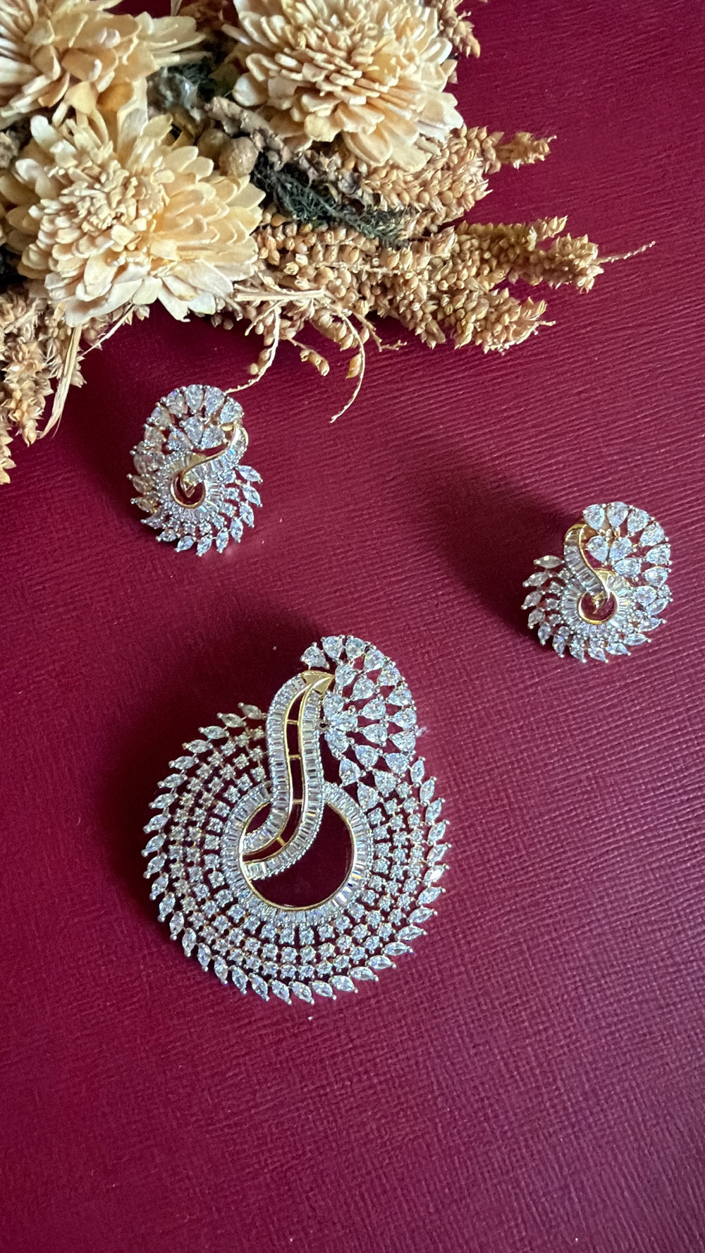Gold-tone green American Diamond pendant set from Hema Collections