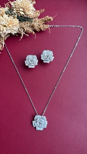 Roosy Pendant Set – silver-toned American Diamond rose pendant and stud earrings