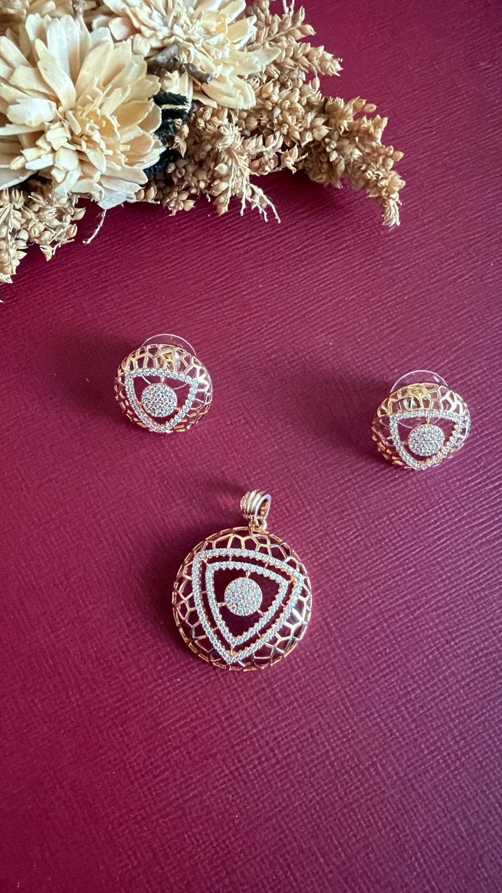 Gold-tone American Diamond pendant set from Hema Collections