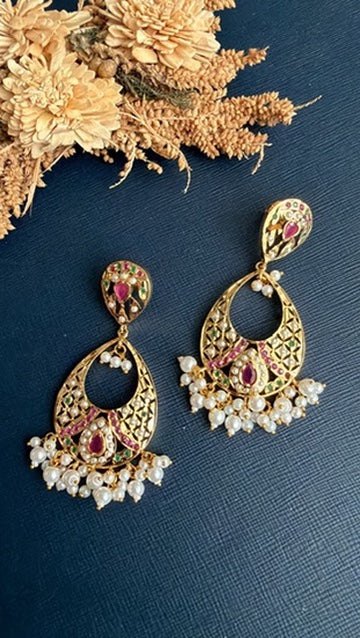 Close-up of the foil-backed Jadau setting and floral jaali work on the Lipika chandbali