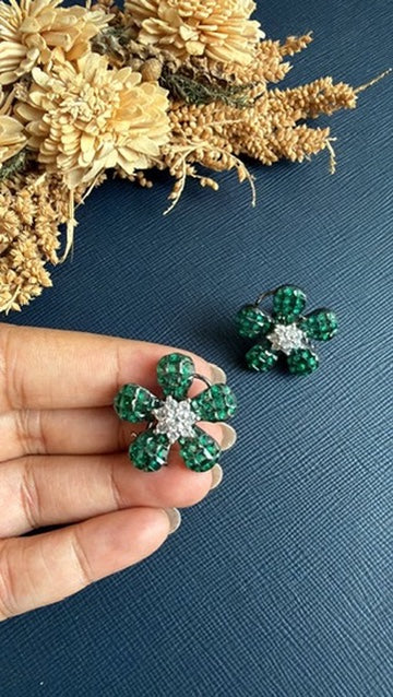 Green and white AD flower stud earrings for festive and party wear