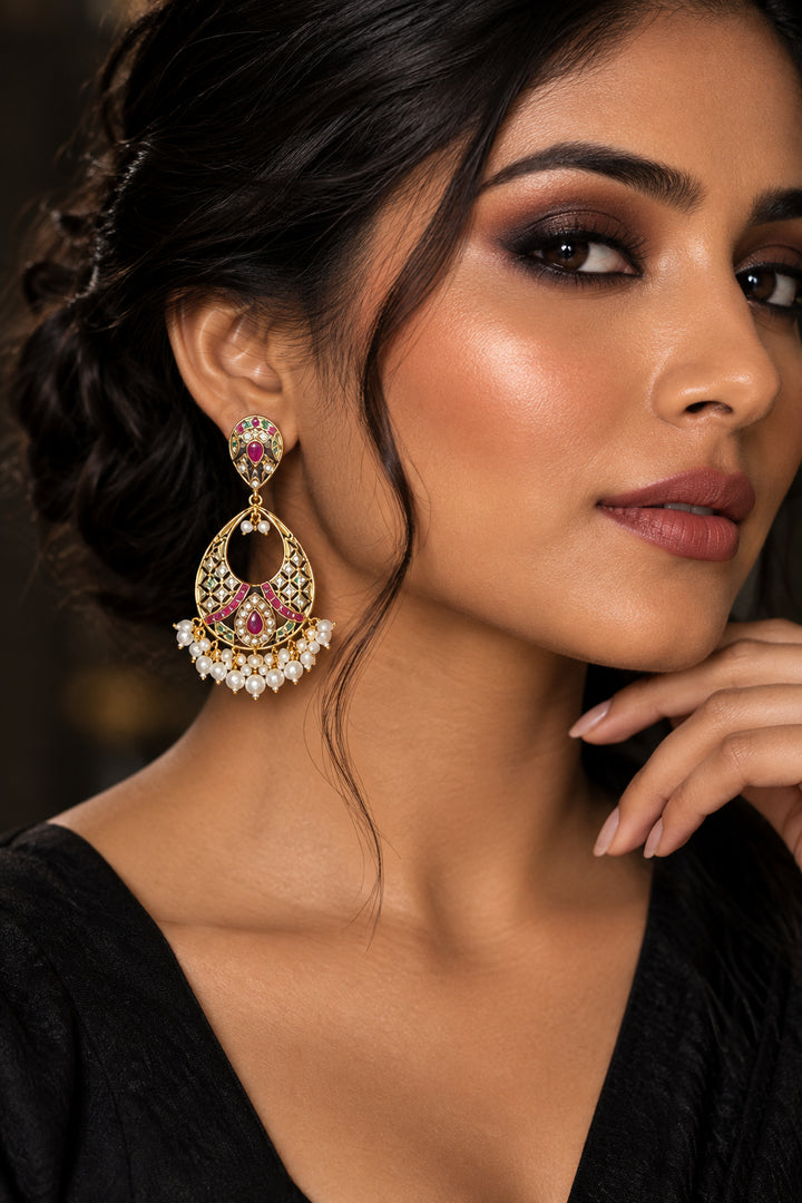 Jadau Kundan chandbali earrings with red stones and a cascading pearl fringe