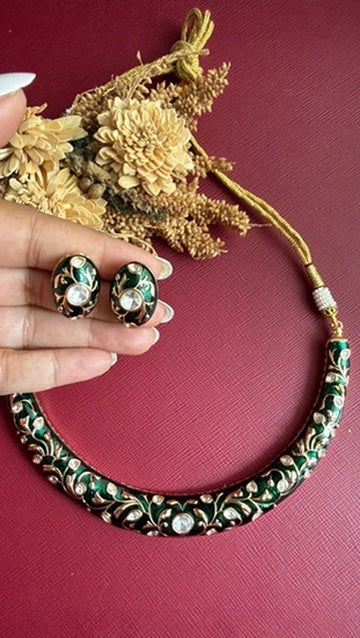 Anushree emerald-green hasli with dori tie and pearl-look bead caps