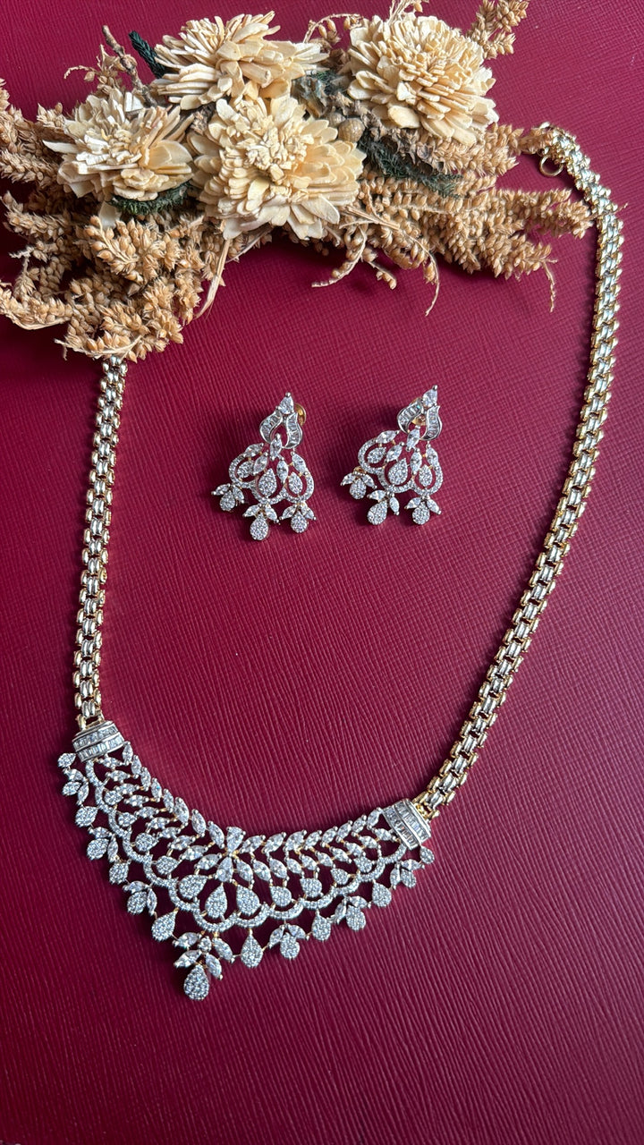 Khristy American Diamond necklace set with marquise leaves, teardrops and baguette cuffs