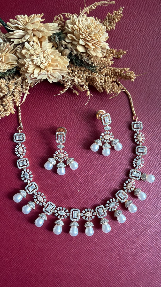 Tanirika American Diamond and pearl-look drop necklace set, full view with gold-toned back chain