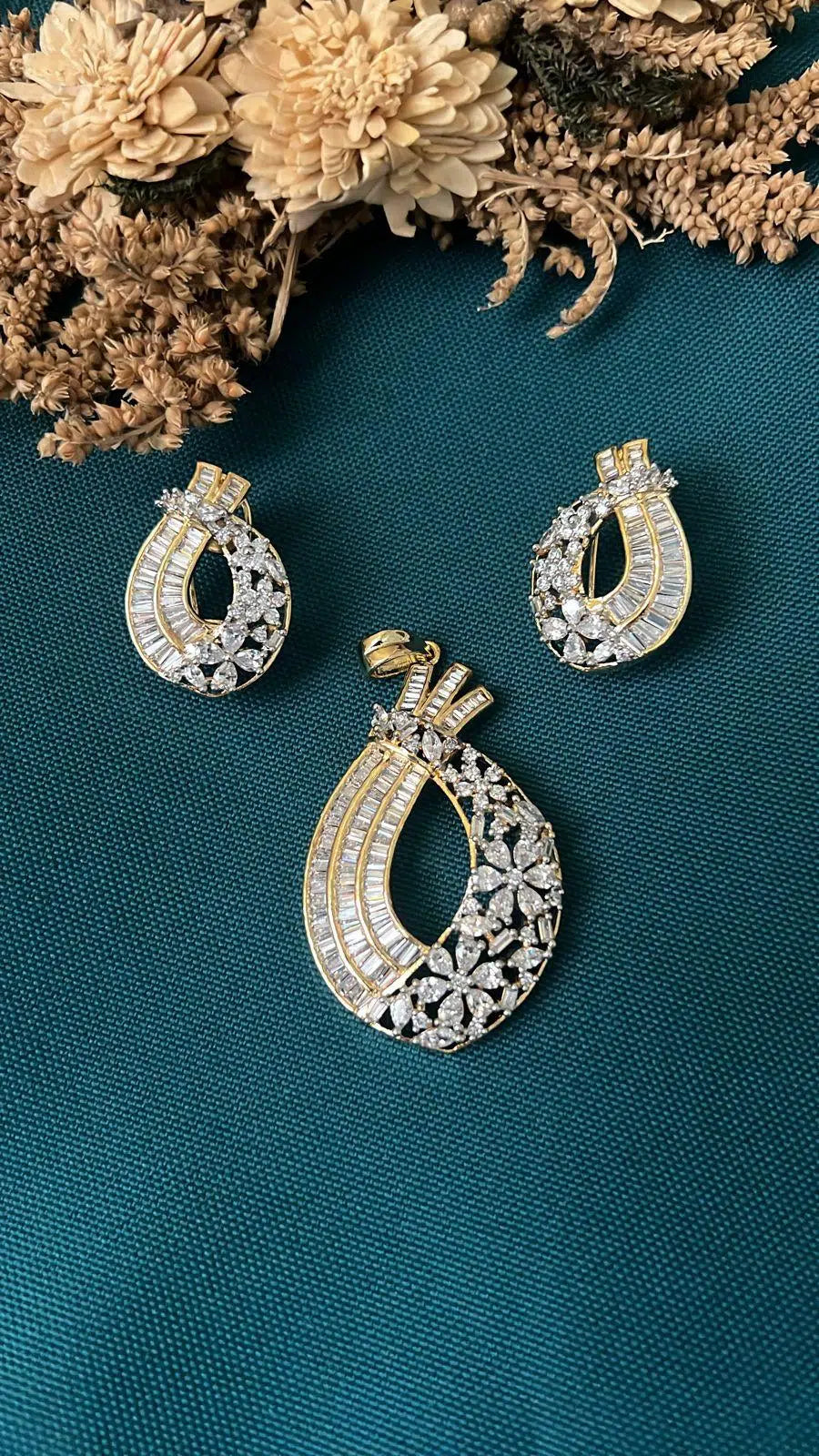 Gold-tone American Diamond pendant set from Hema Collections