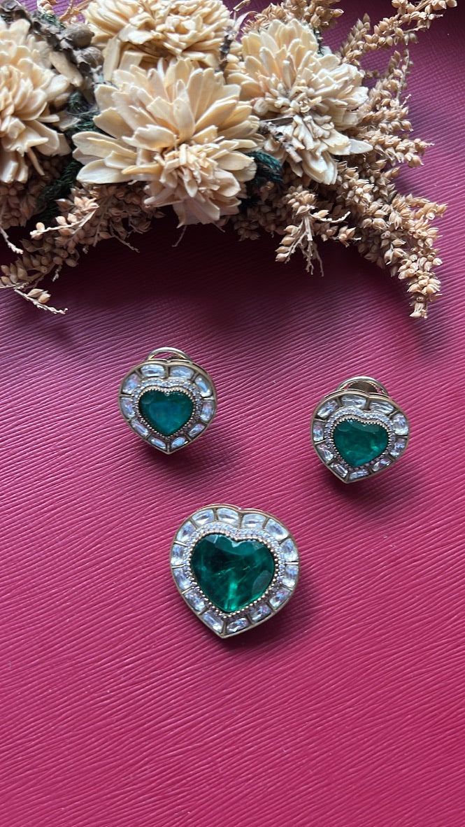 Gold-tone green doublet stone pendant set from Hema Collections