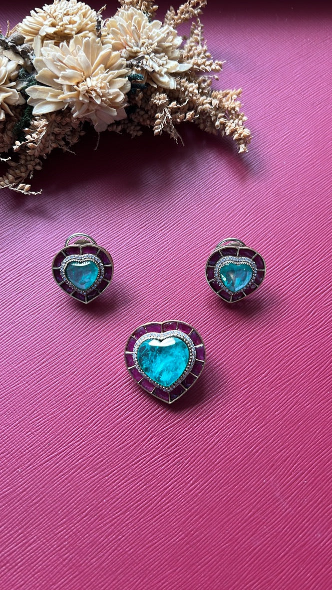 Gold-tone sea green doublet stone pendant set from Hema Collections